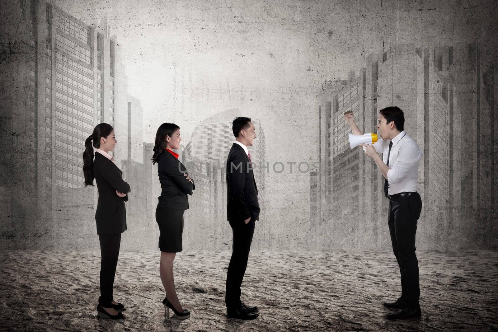 Business leader command his subordinate using megaphone. Business leadership concept