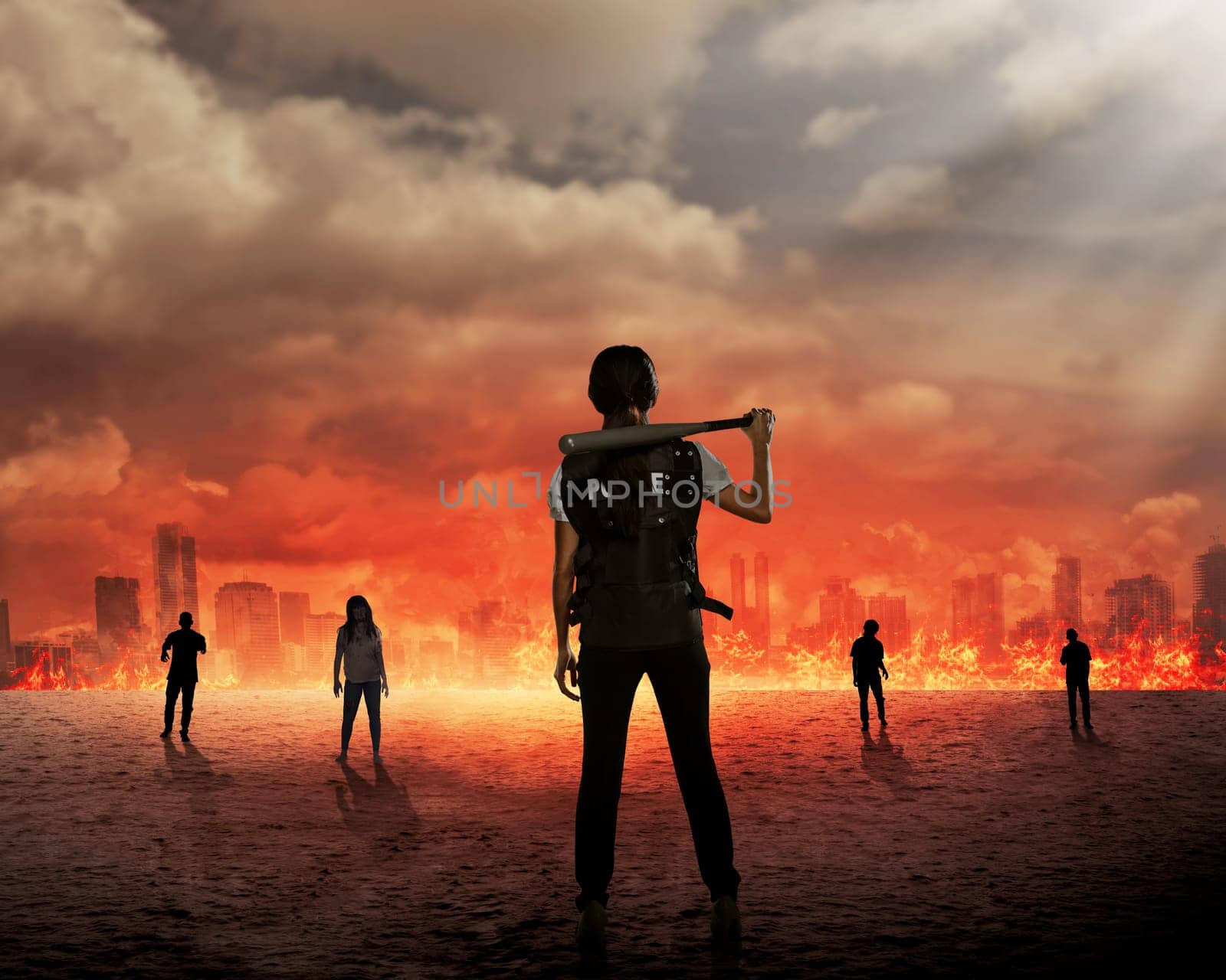 Back view of police woman ready to fight zombie on burn city