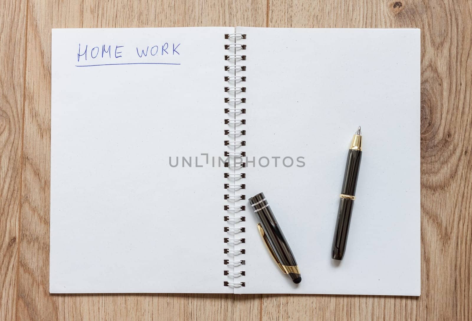 open notebook waiting for home work ready pen