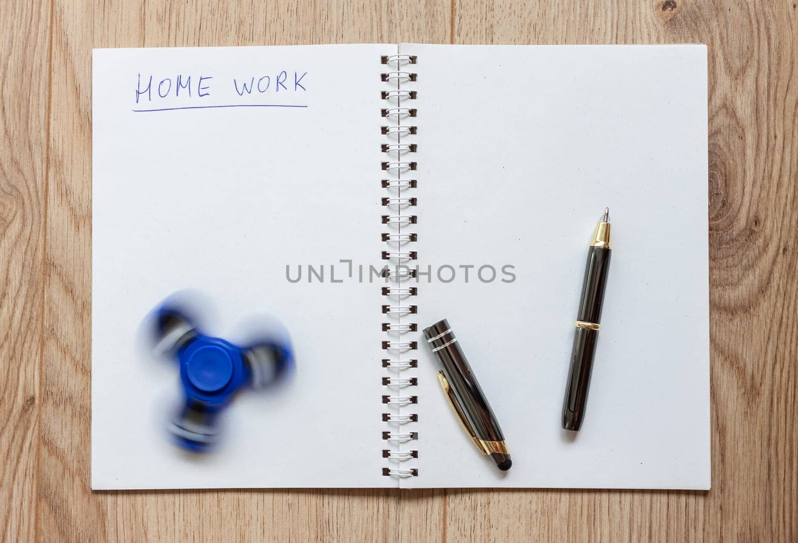 open notebook waiting for home work distracting spinner