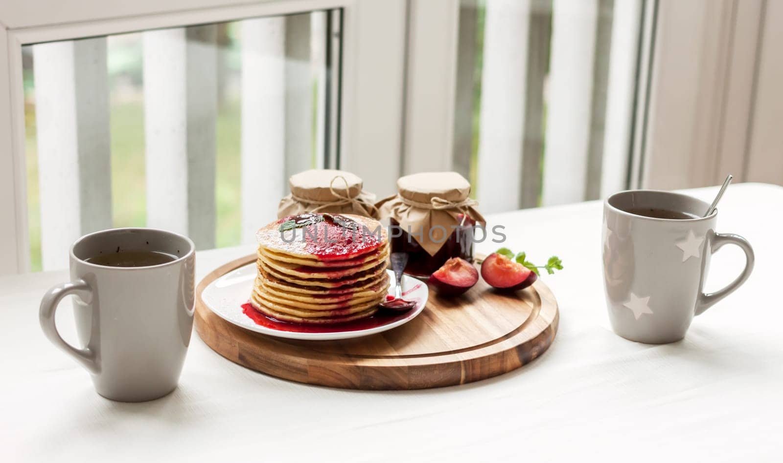 pancakes with plum jam delicious american breakfast