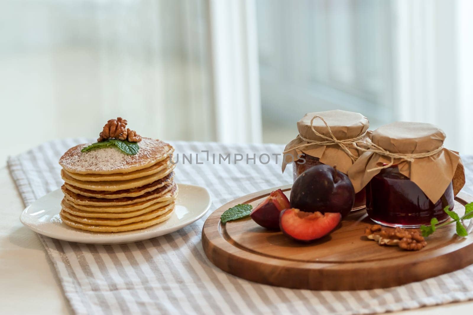 pancakes with plum jam delicious american breakfast