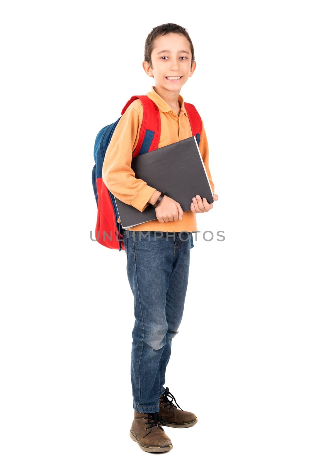 Young boy posing ready to go back to school