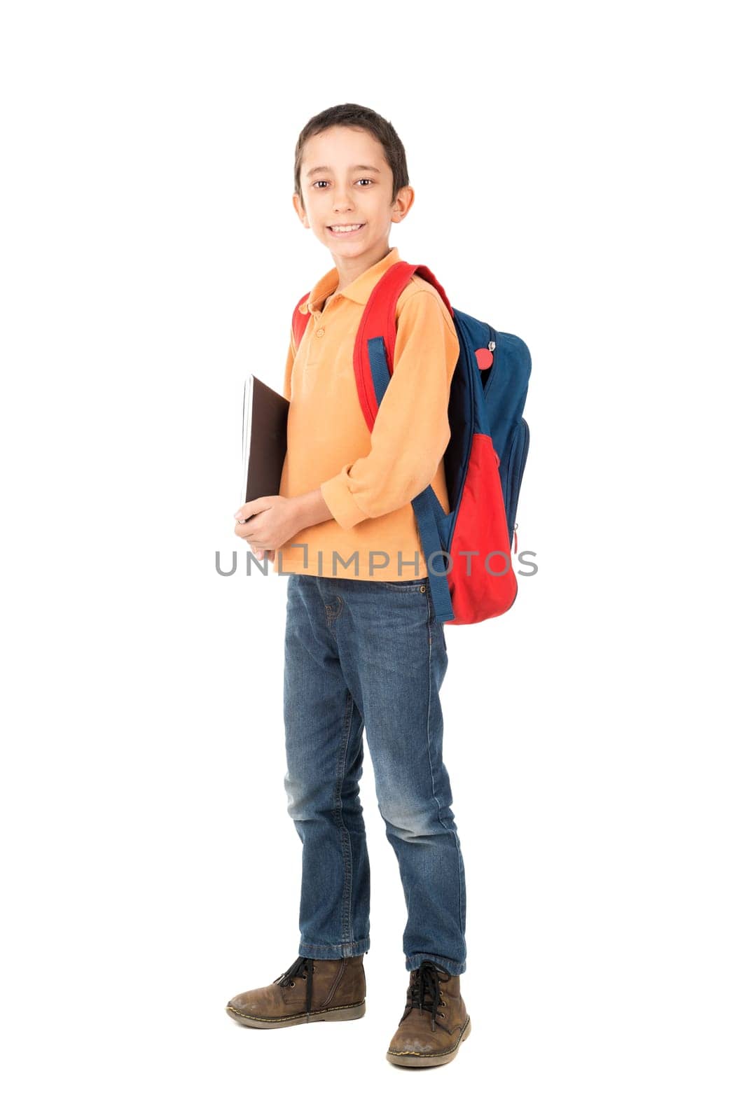 Young boy posing ready to go back to school