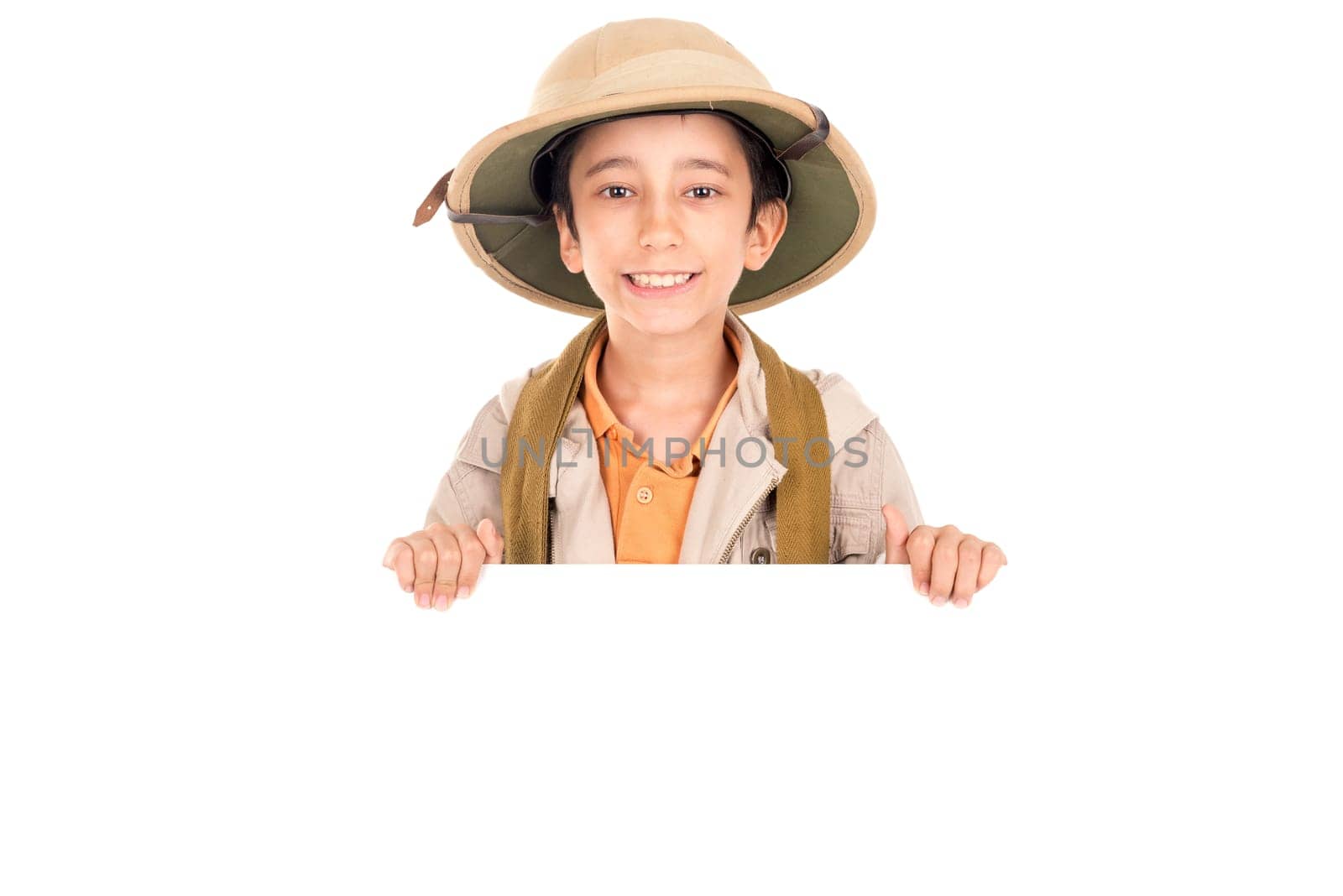 Young boy with Safari clothes behind a white board isolated in white