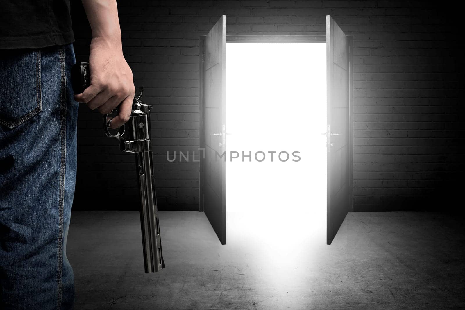 Man hand holding gun, going outside the door