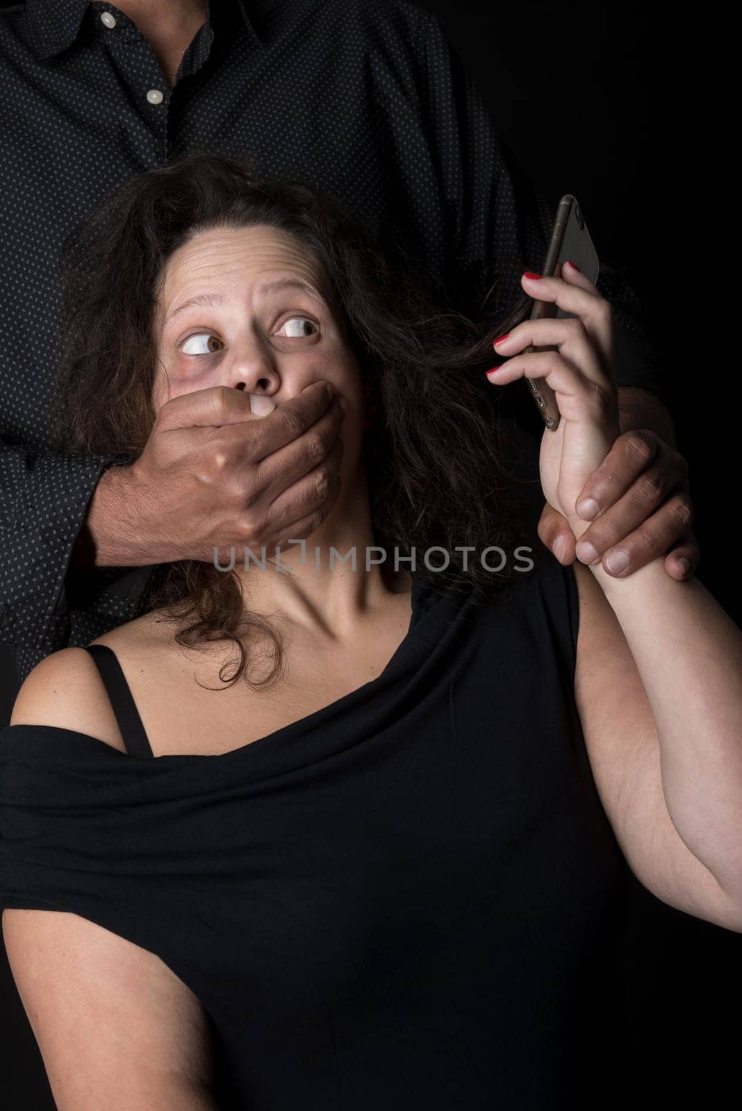 Abused woman victim of domestic violence, calling for help