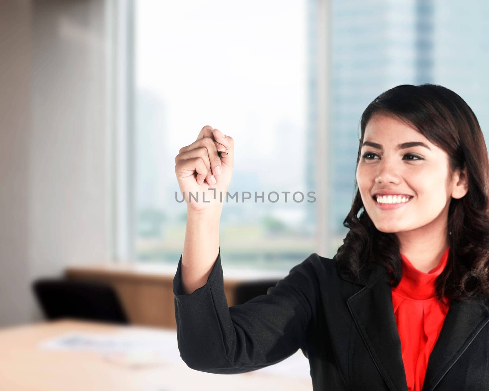 Business woman writing video marketing with handwriting and circle