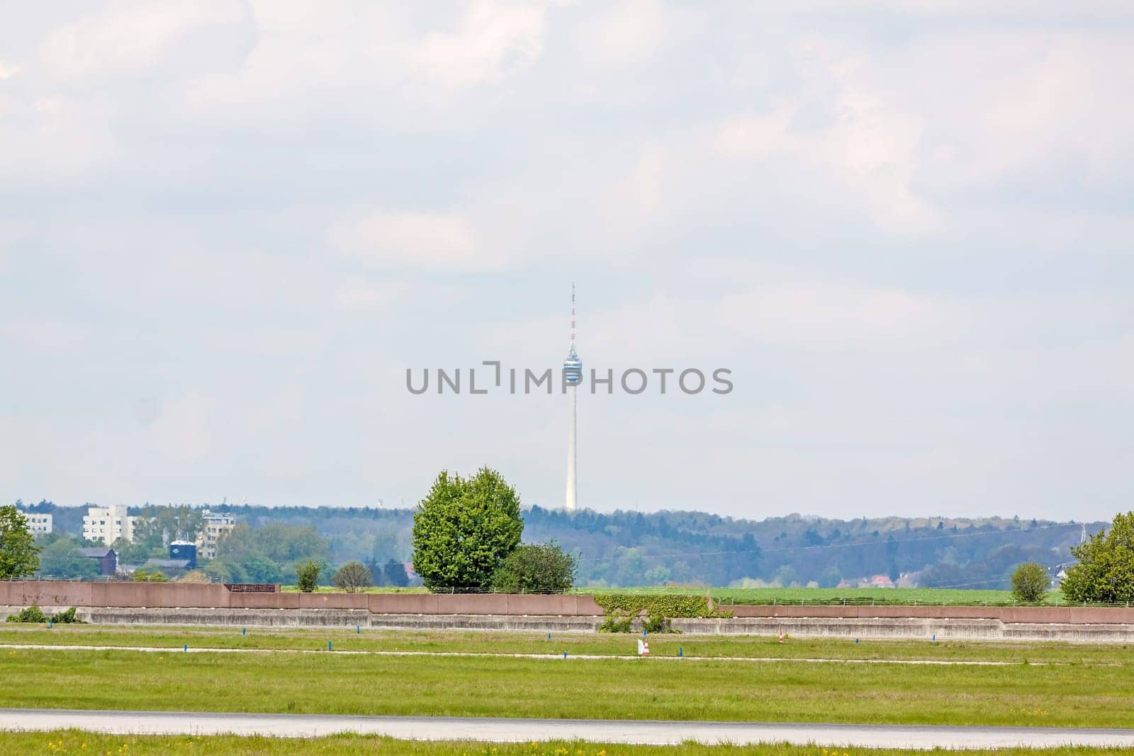 TV Tower Stuttgart - view from Airport Stuttgart, green meadow an runway in front