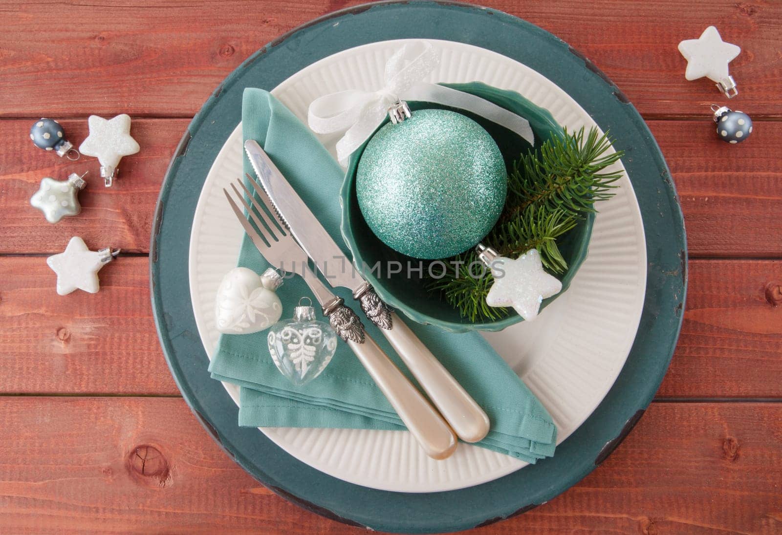 Colorful table set on rustic wood for Christmas