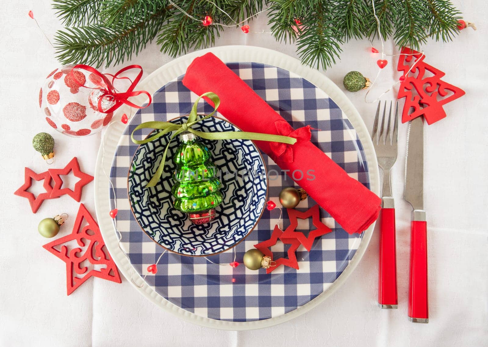 Colorful table set on rweisser tablecloth for Christmas