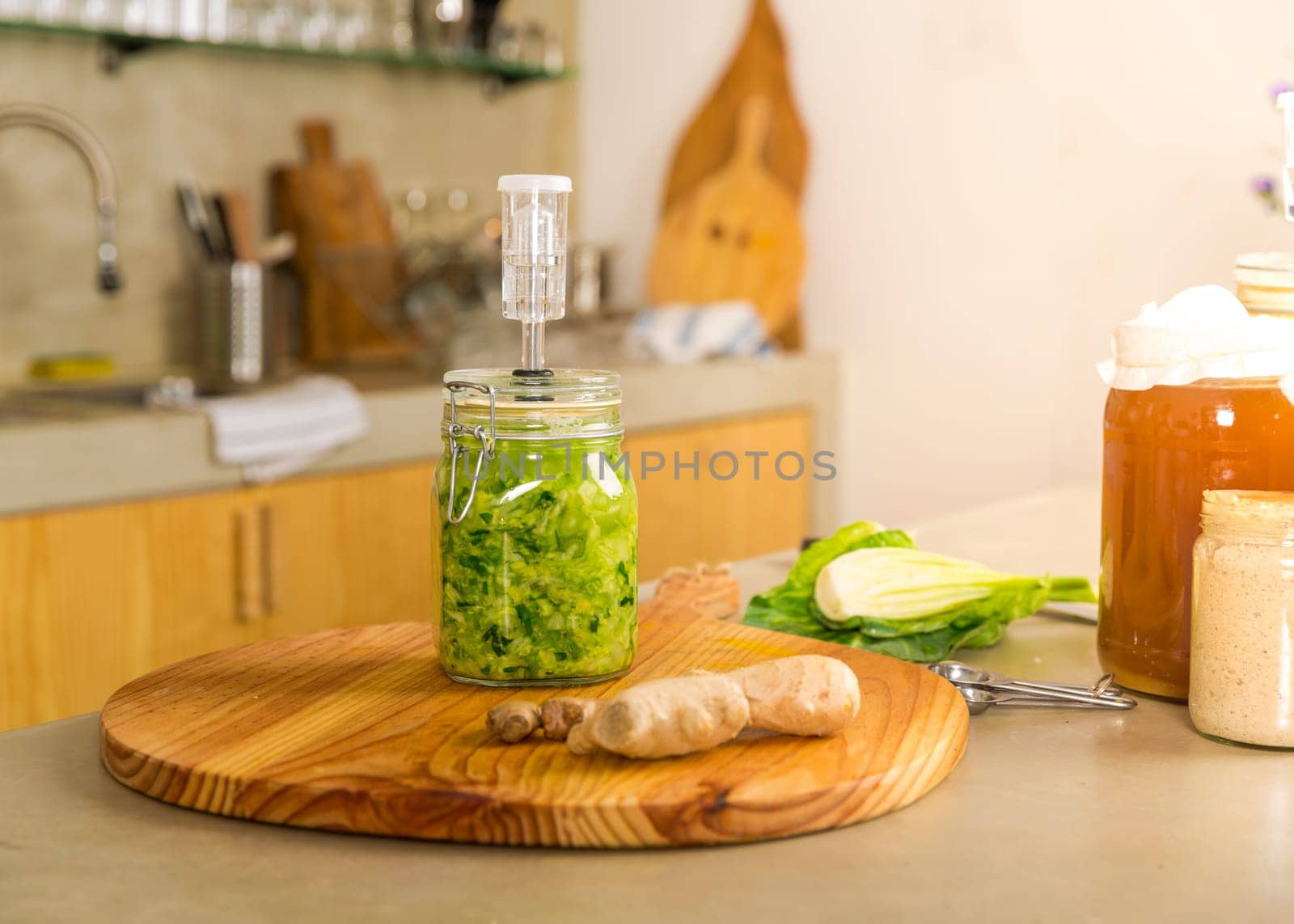 Fermented preserved vegetables. Cabbage kimchi and sauerkraut sour cabbage glass jars..