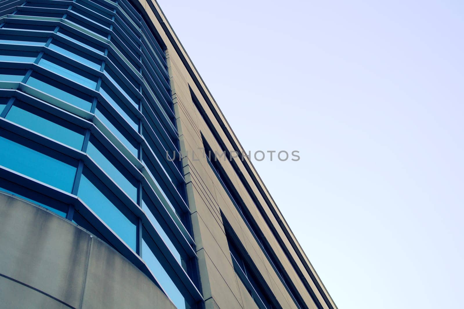concrete building metal architecture round corner windows angle sky