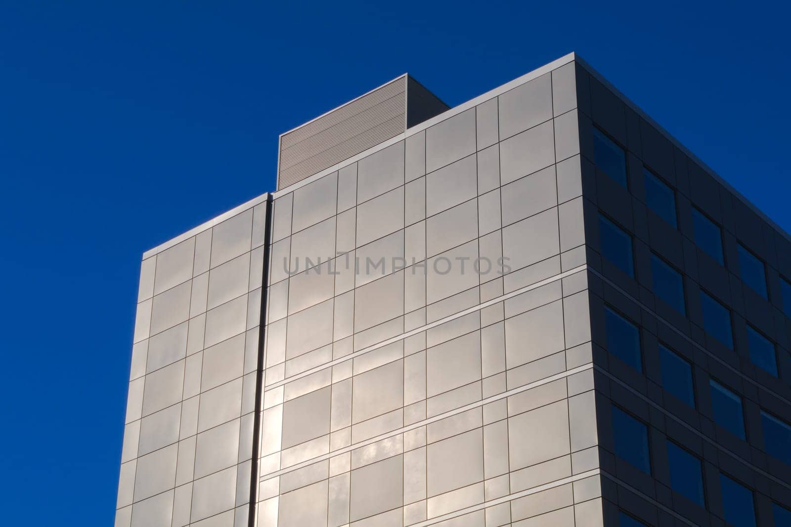 skyscraper wall building office facade sunlight futuristic downtown corporation