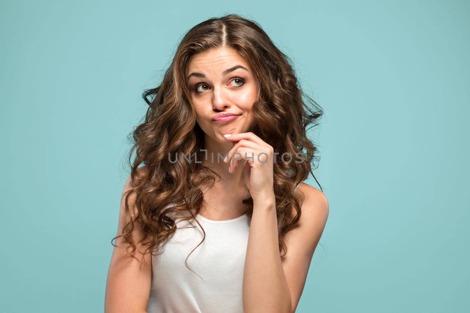 The portrait of disaffected woman on studio background