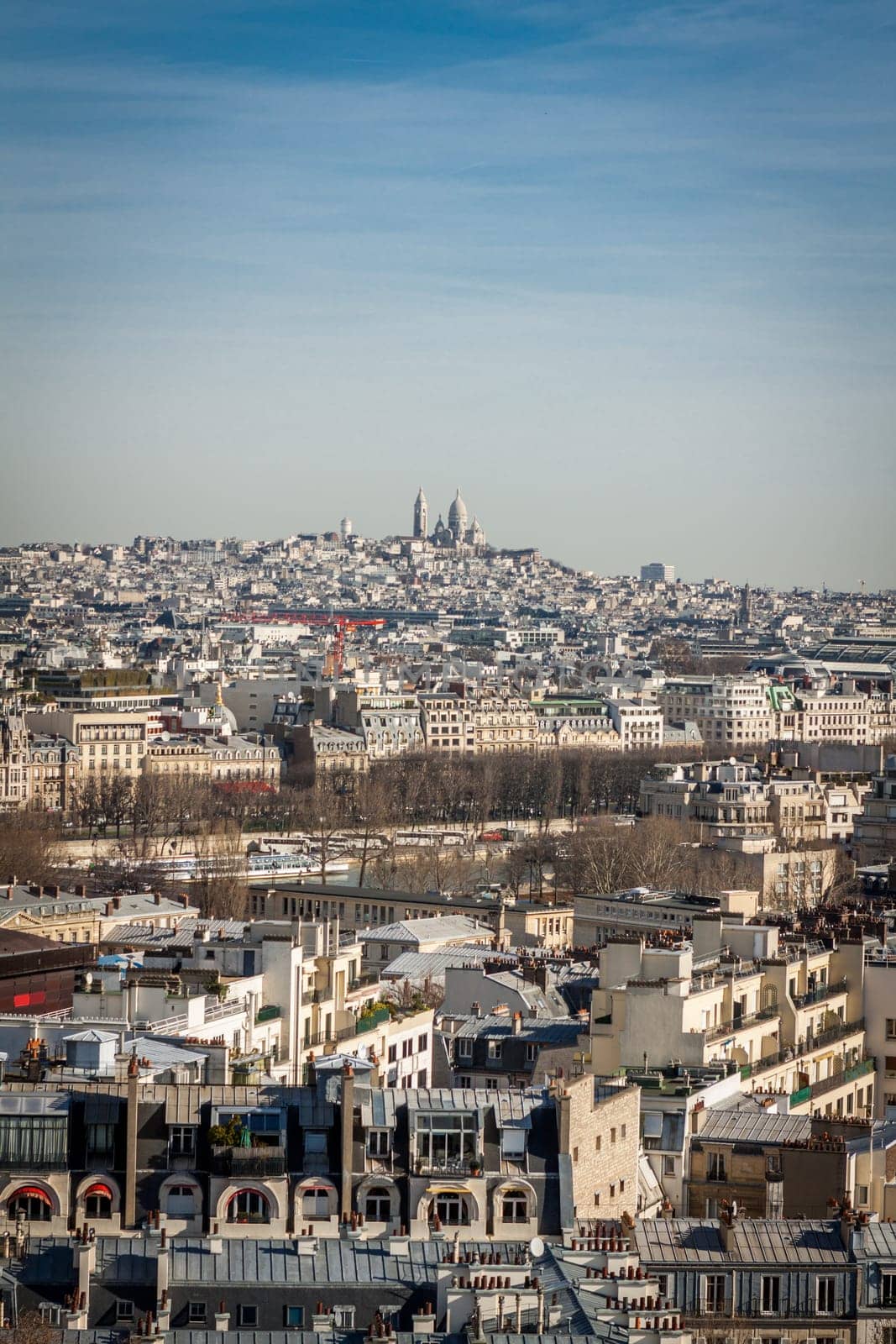 Skyline of Paris with cityscape on the Saine with blue sky in summer