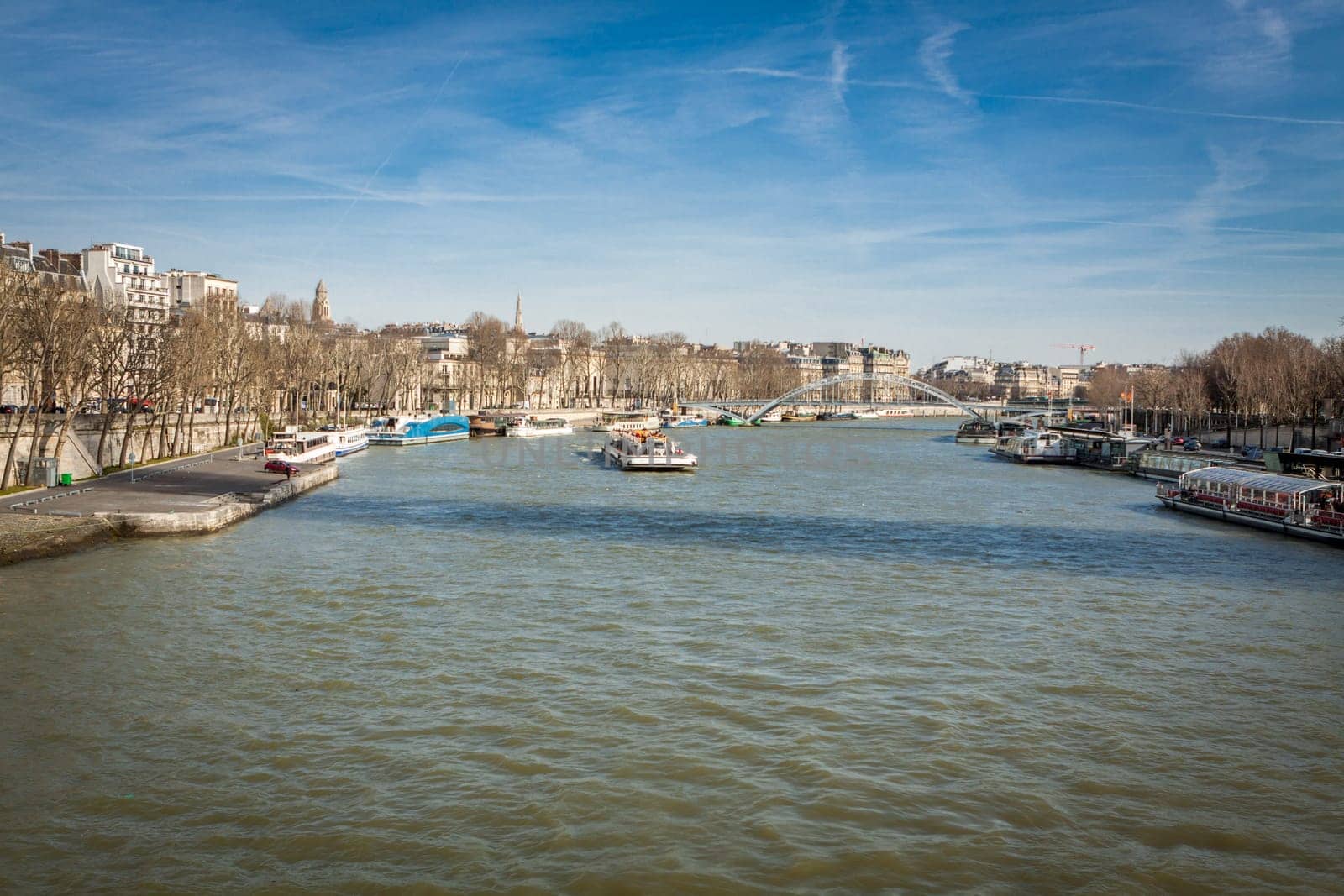 Skyline of Paris with cityscape on the Saine with blue sky in summer
