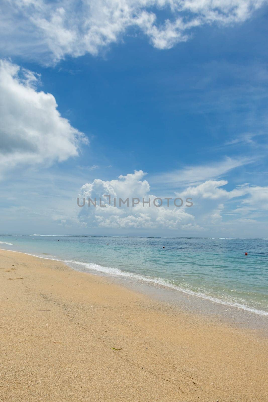Beautiful secluded sandy beach in the Caribbean with white sand and blue sky as in paradise