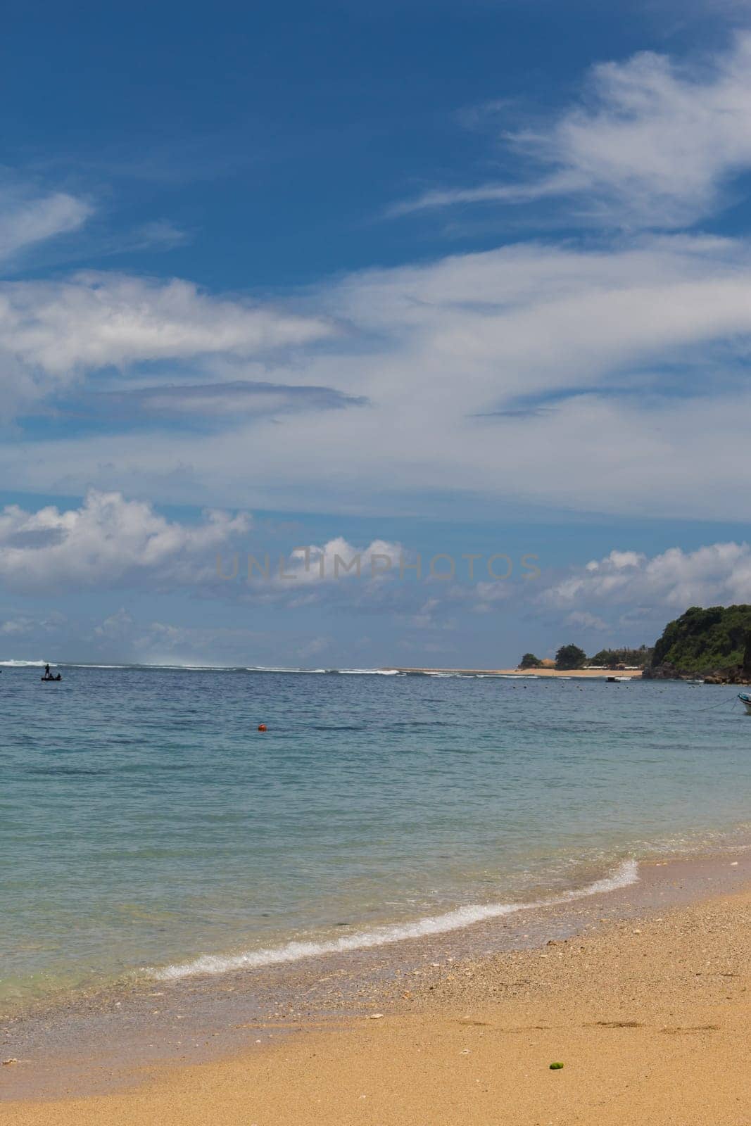 Beautiful secluded sandy beach in the Caribbean with white sand and blue sky as in paradise