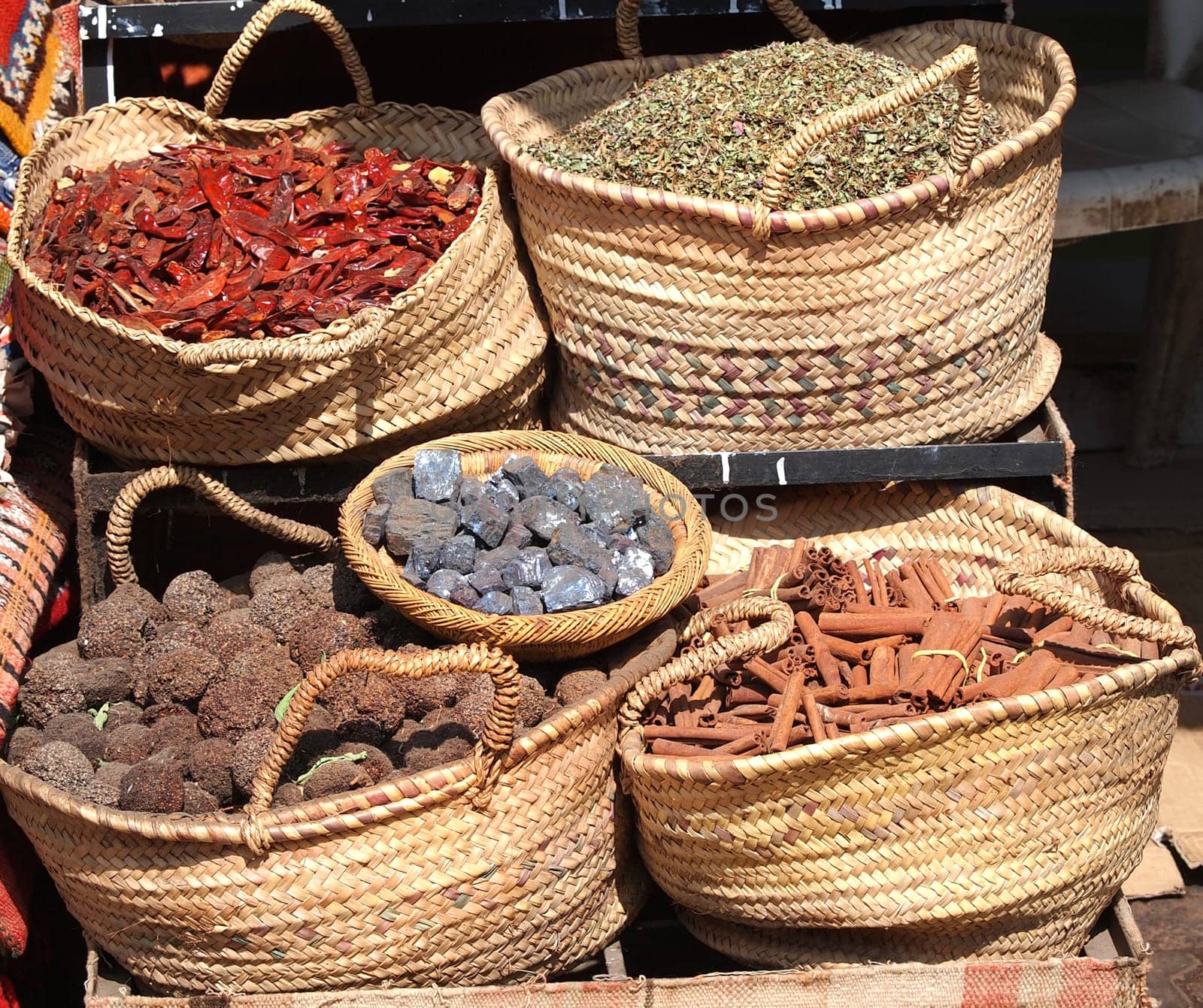spices in baskets on open market in Morroco