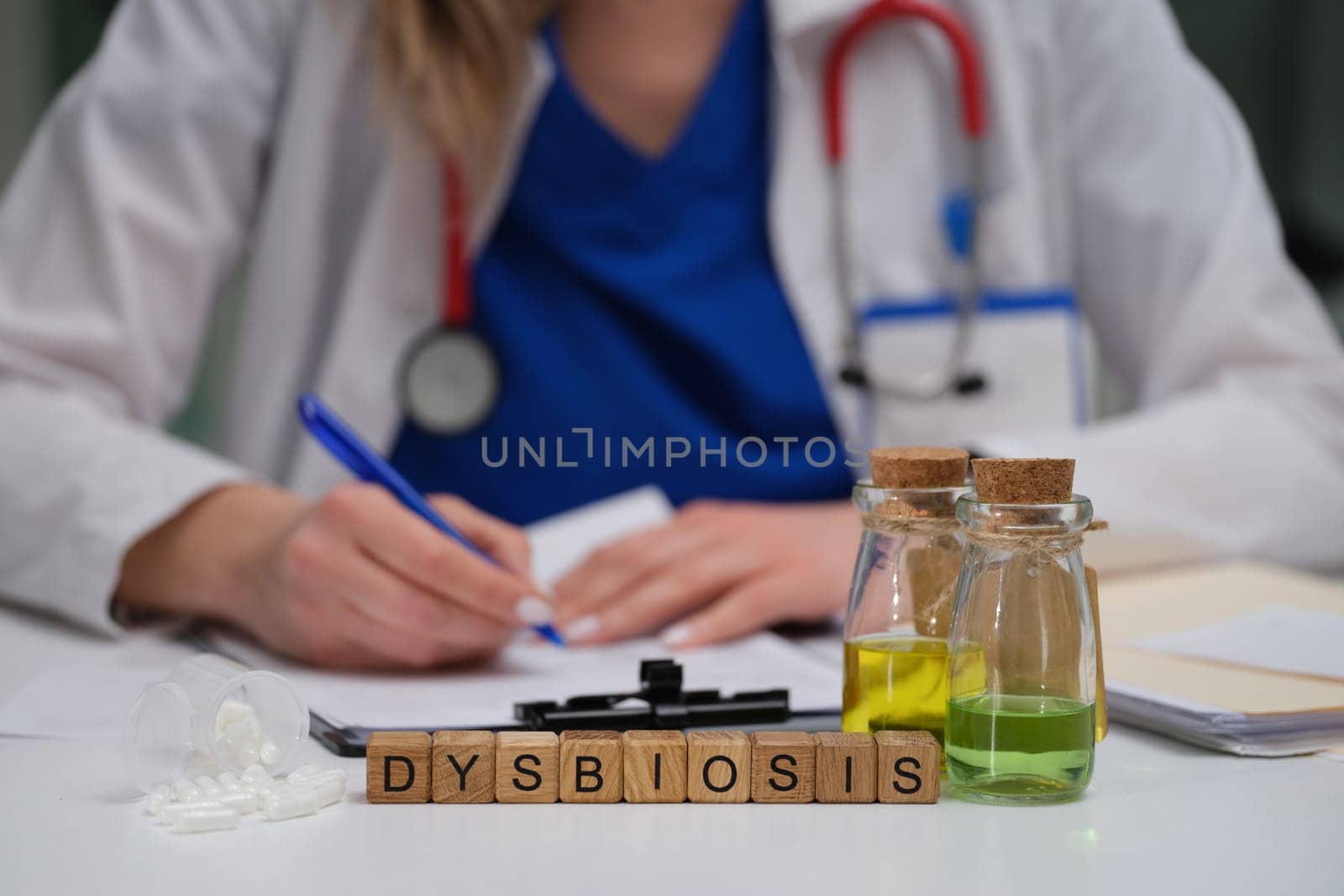 A healthcare professional conducts a thorough study of dysbiosis using laboratory samples while taking notes