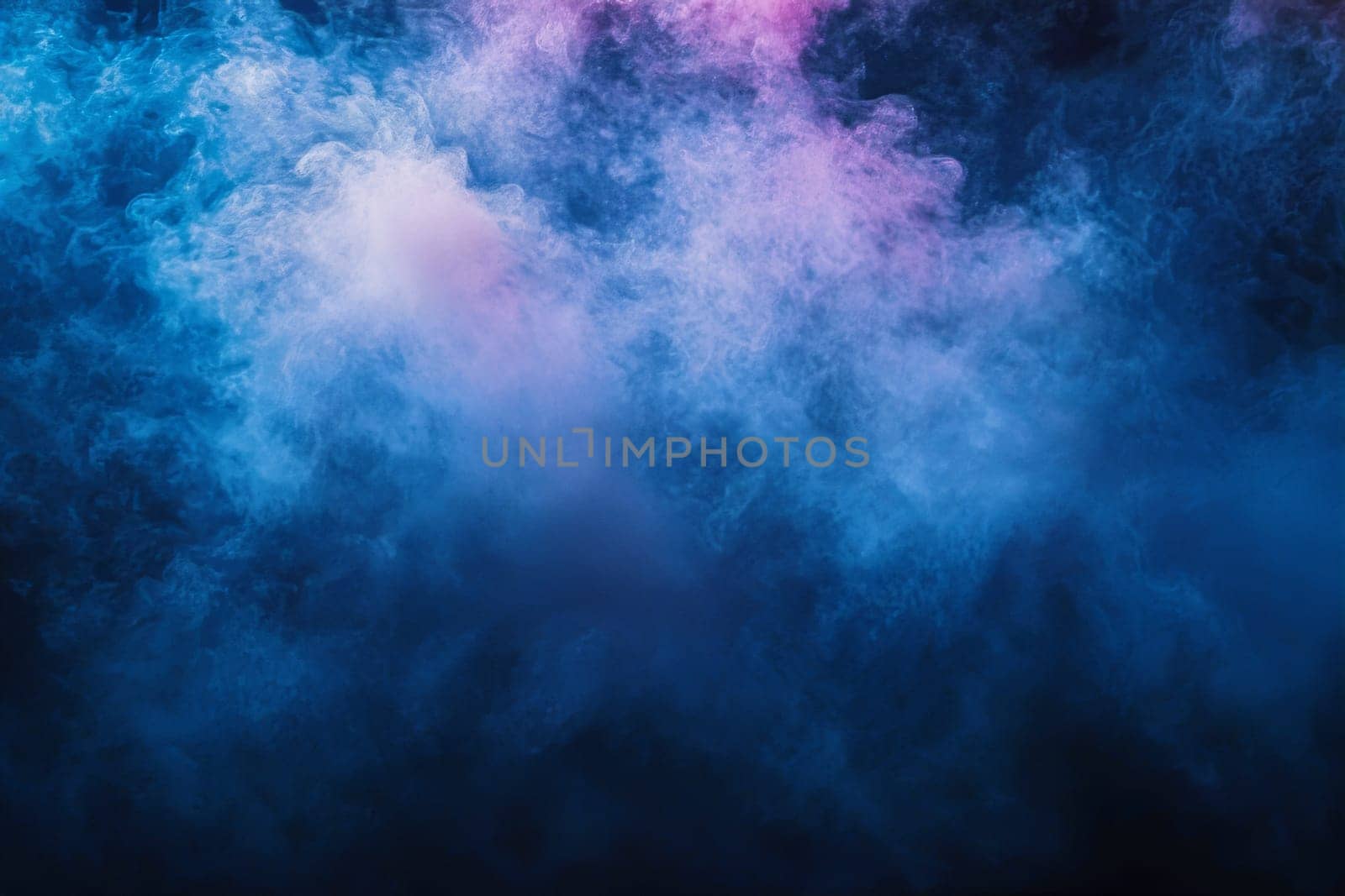 Swirling mist filled with shades of blue, pink, and purple envelops the dark space, adding a dreamlike quality to its ambiance.