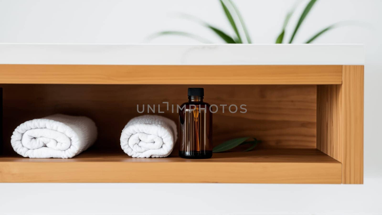 Spa treatment set, wooden shelf with neatly folded towels and dispensers for soap, cream, massage oil. High quality photo