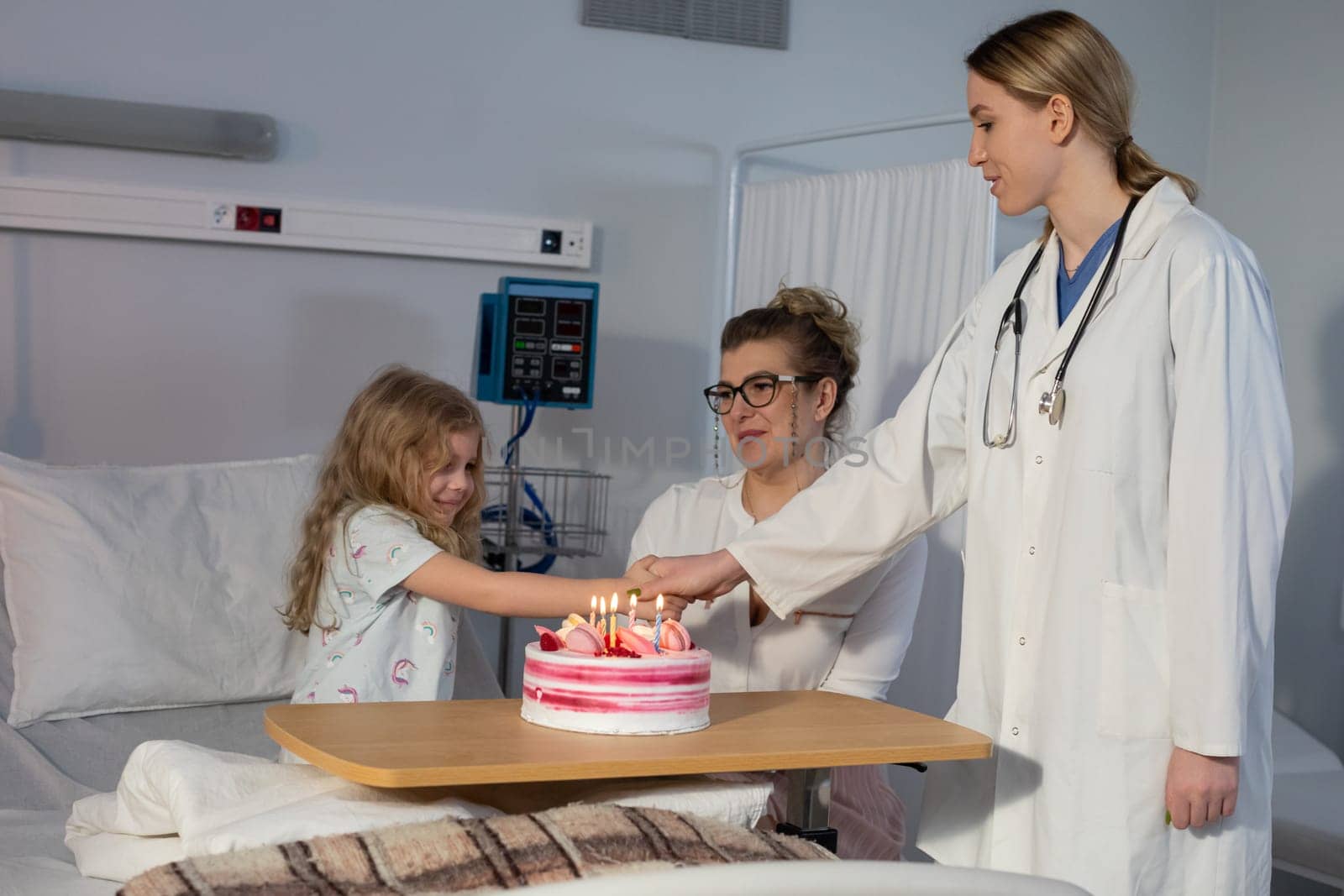 A heartwarming and touching scene of a joyful birthday celebration taking place in a hospital setting