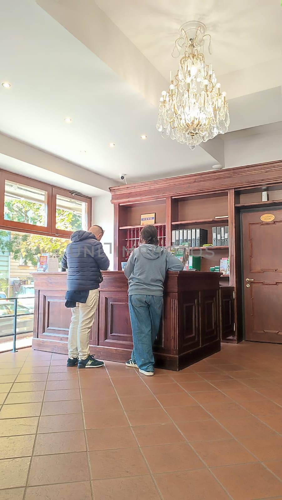 October 15 2024 Prague Czech Republic Europe Hotel reception area people travel tourists tourism room apartment . High quality photo