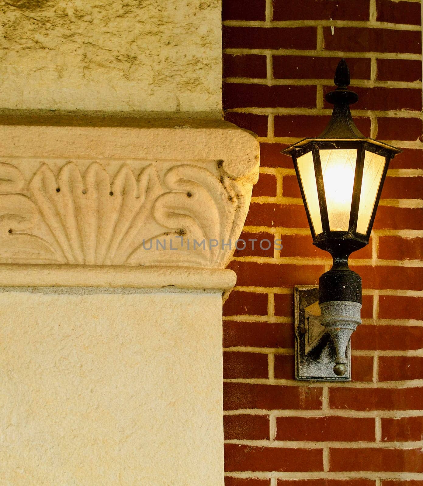 Nineteenth  century entrance pillar with lamp at side