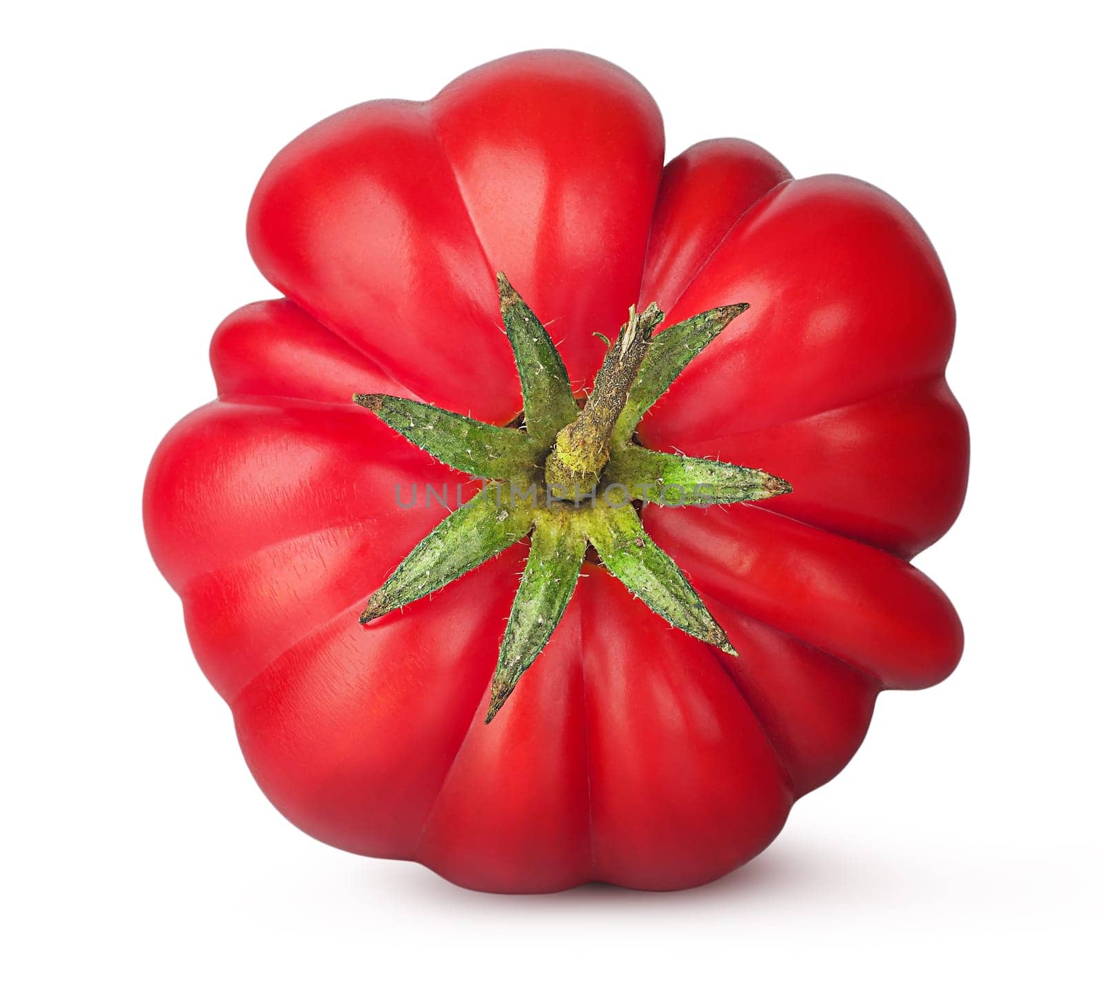 Fresh heirloom tomato top view isolated on white background