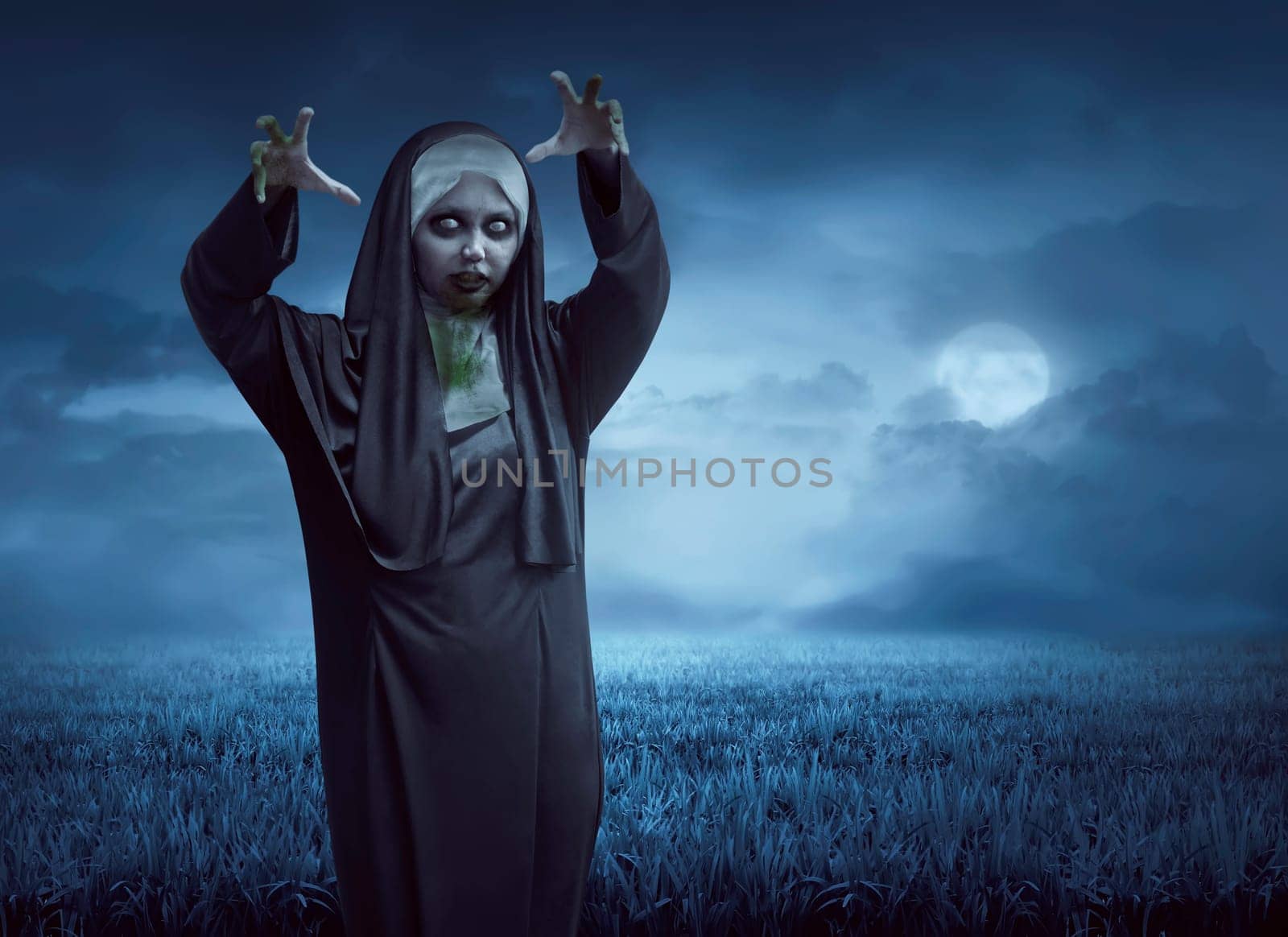 Scary asian nun on a black cape standing in the moonlight