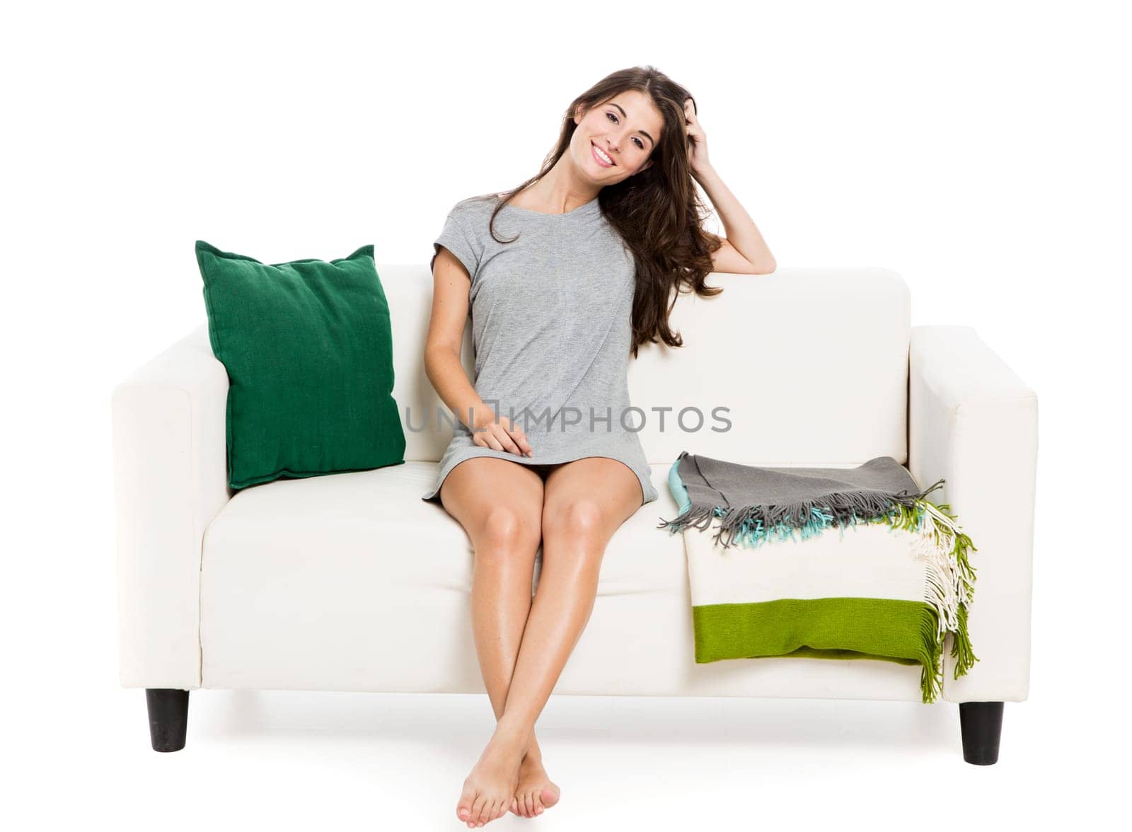 Beautiful woman listen music at home, isolated in white
