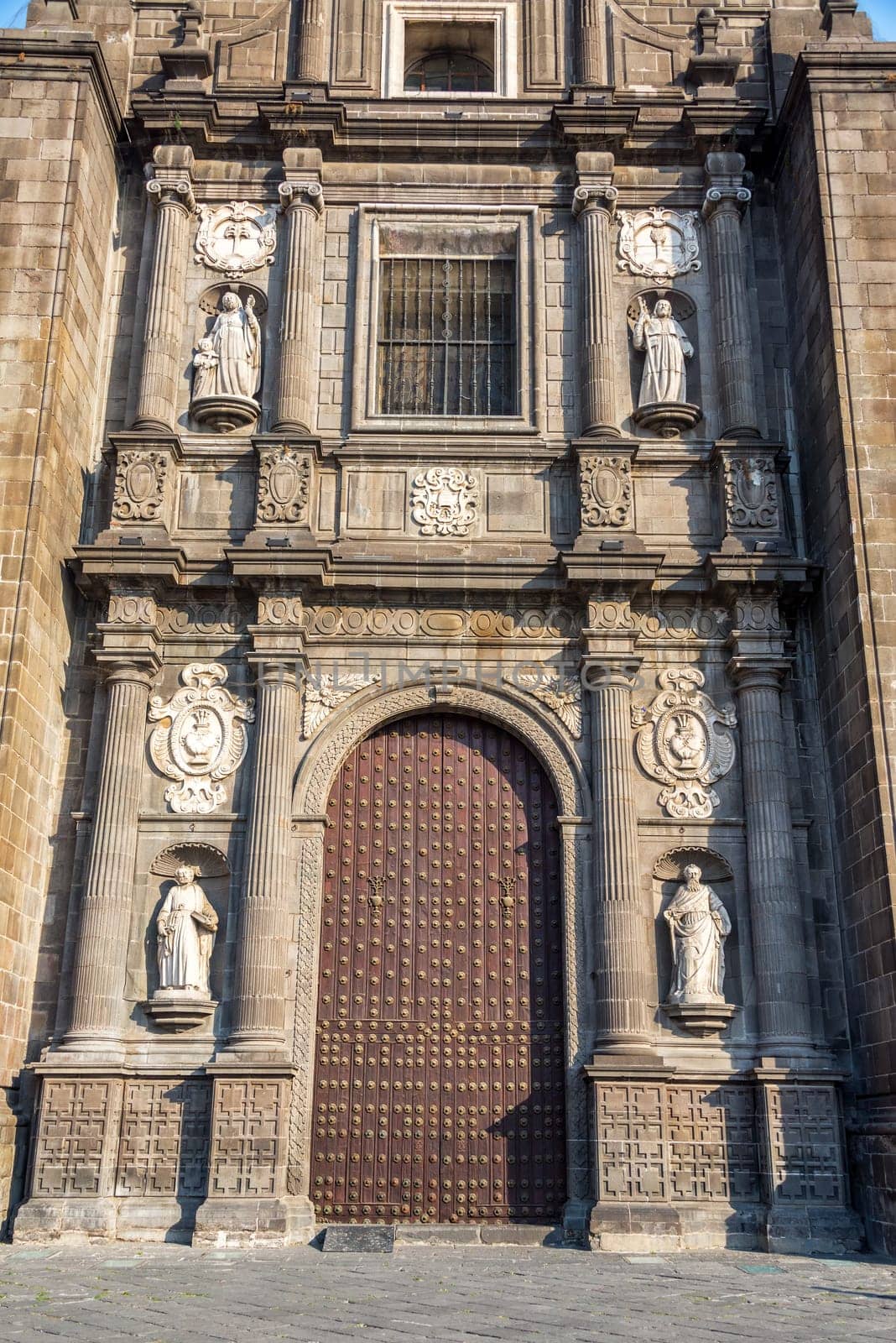Beautiful ornate entrance to the cathedral of Puebla, Mexico