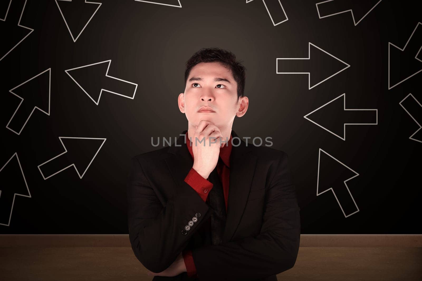 Business man think with arrow shape on the background