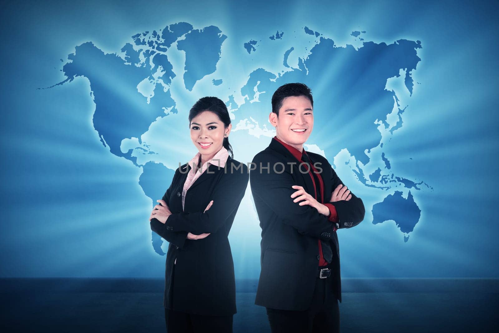 Business man and woman over world map background. Business team conceptual