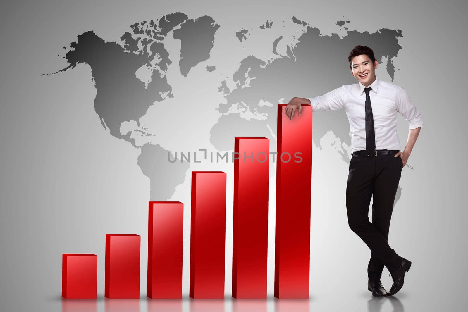 Asian business man lean on increasing graph