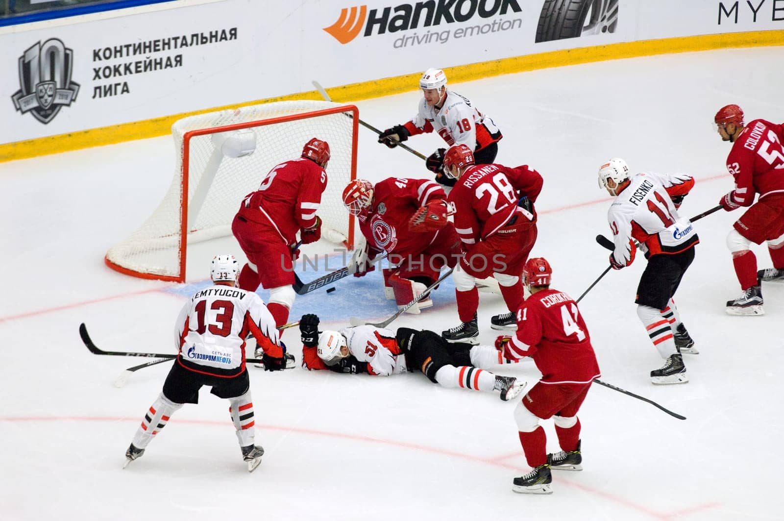 PODOLSK, RUSSIA - SEPTEMBER 3, 2017: M. Mineyev (51) fall down on hockey game Vityaz vs Avangard on 10th Russia KHL championship on September 3, 2017, in Podolsk, Russia. Vityaz won 6:2
