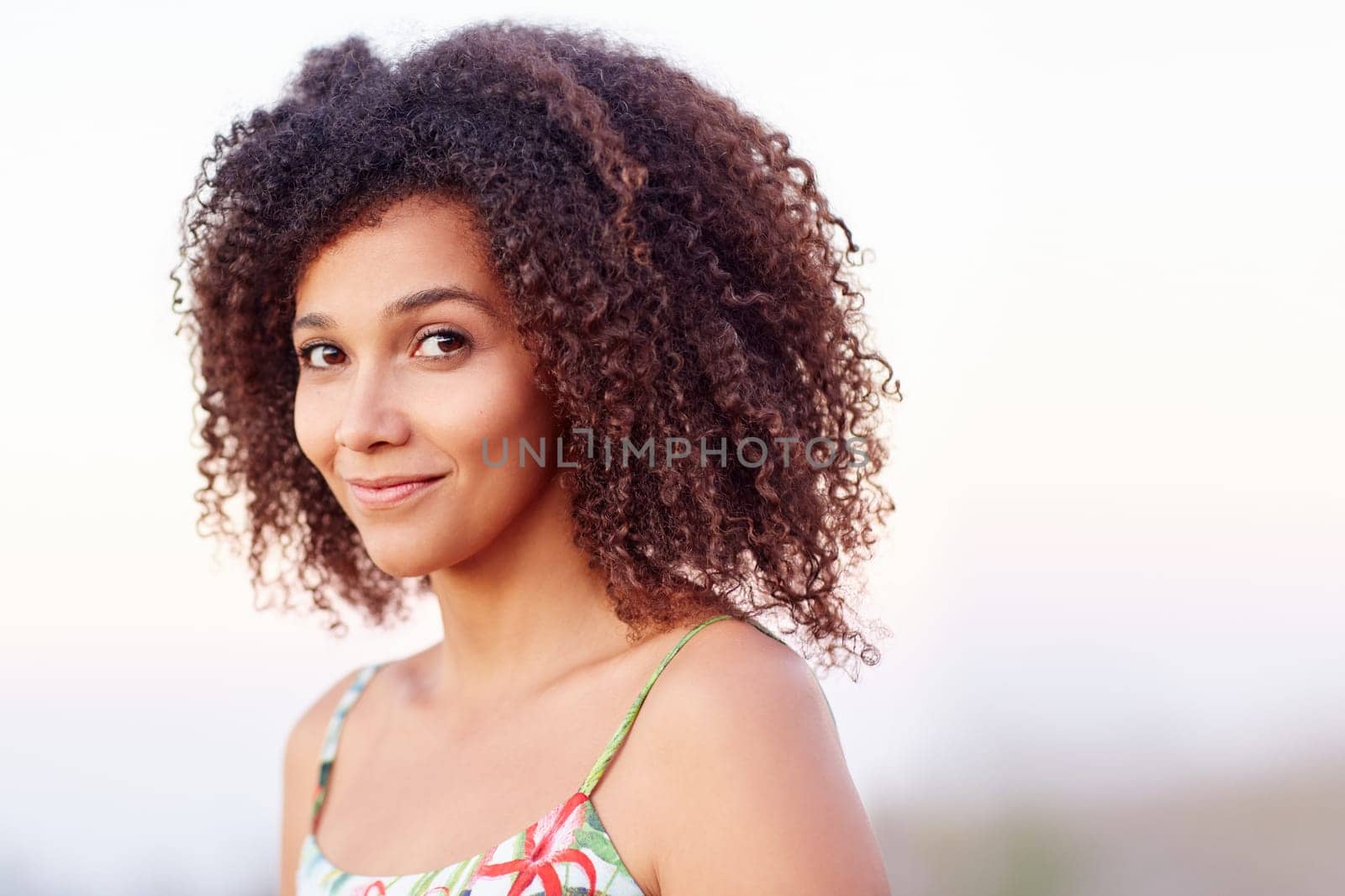 Closeup of a beautiful young woman outdoors