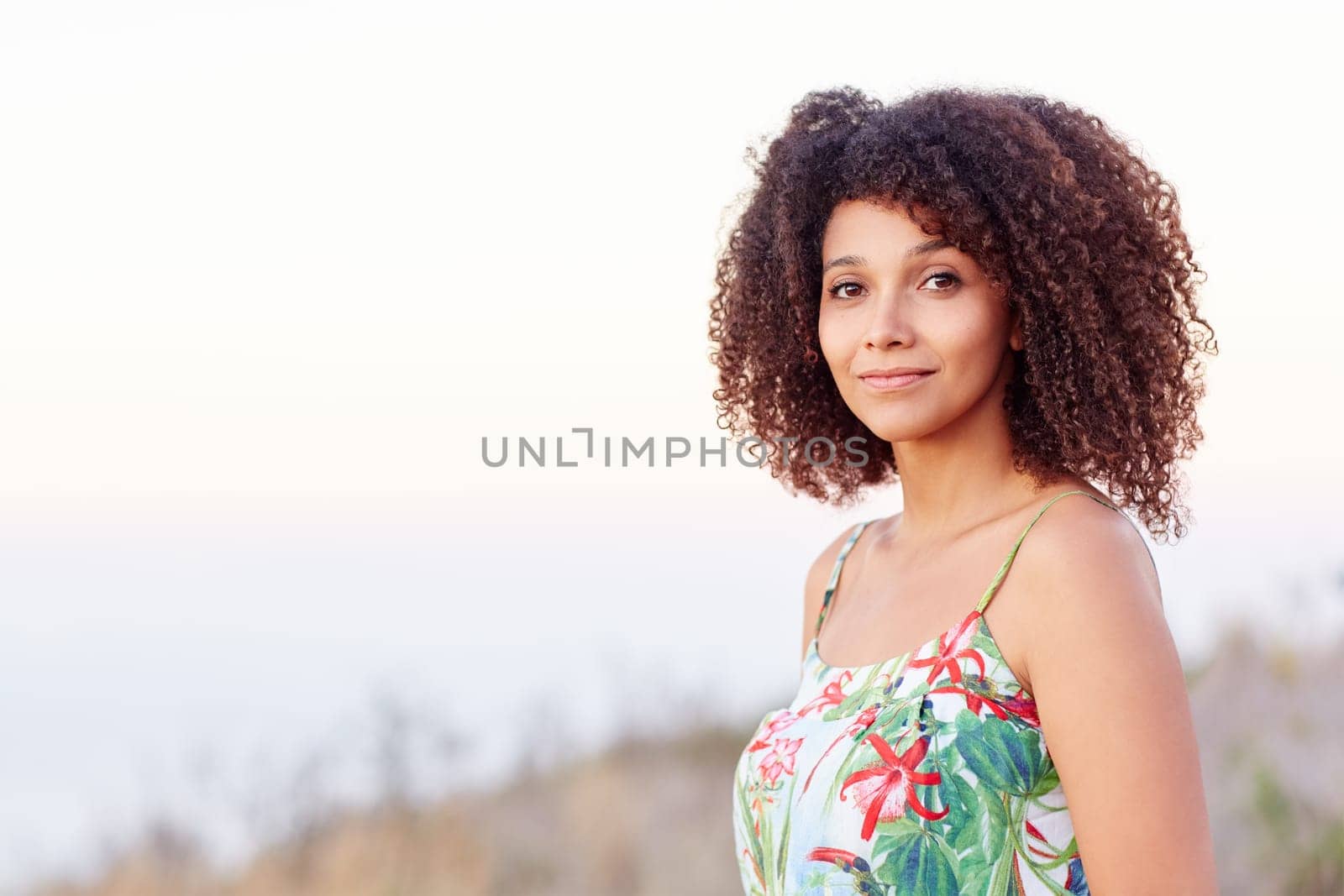 Closeup of a beautiful young woman outdoors