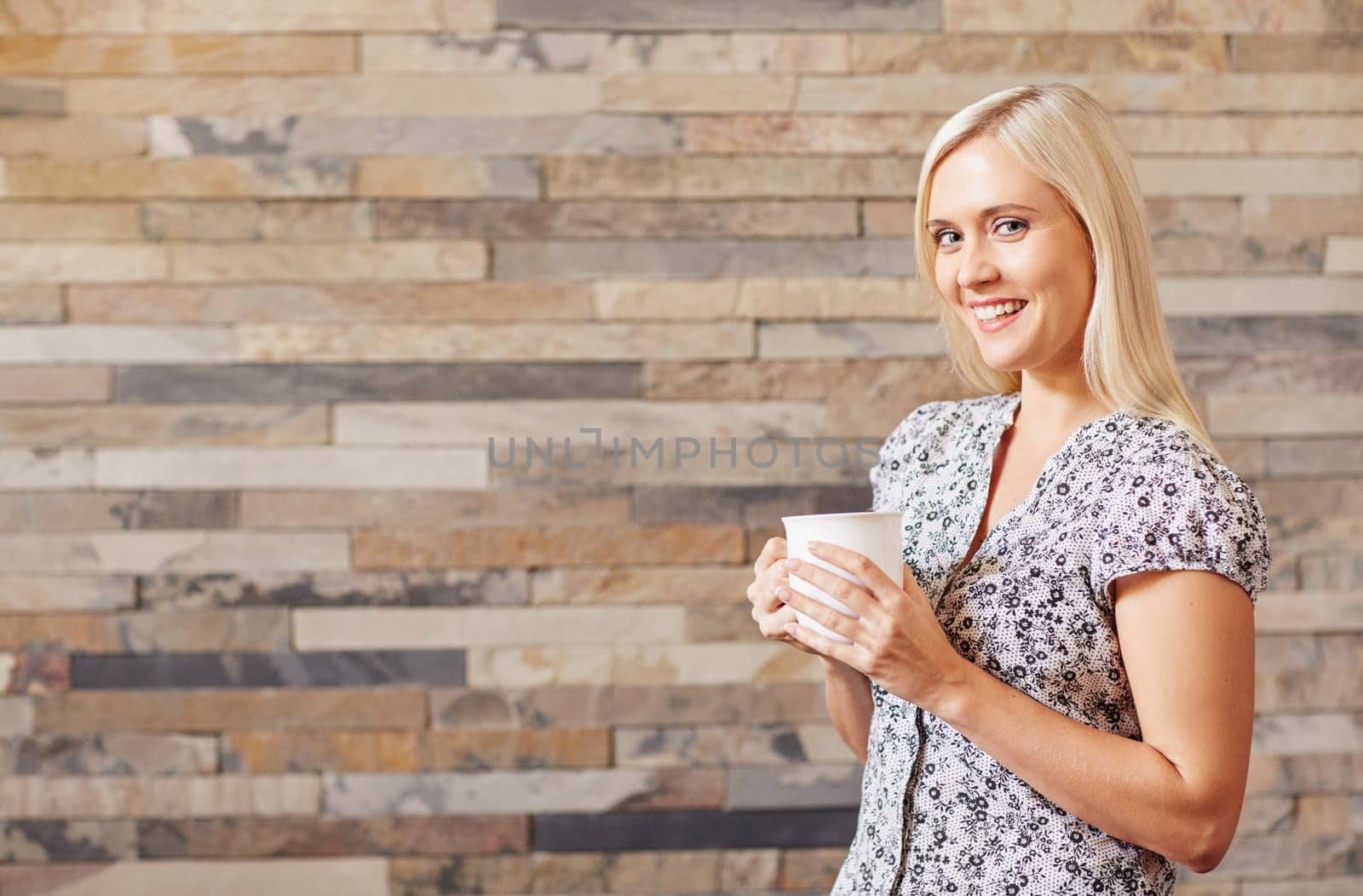 A young woman with a cup of coffee