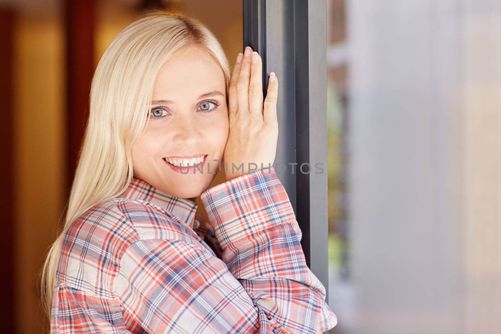 A beautiful young woman in her pyjamas at home