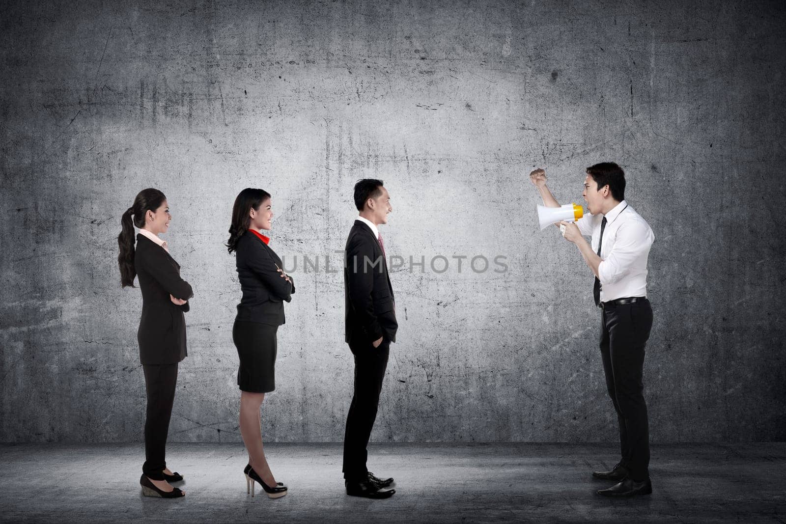 Leader give order via megaphone to his subordinate. Business communication concept