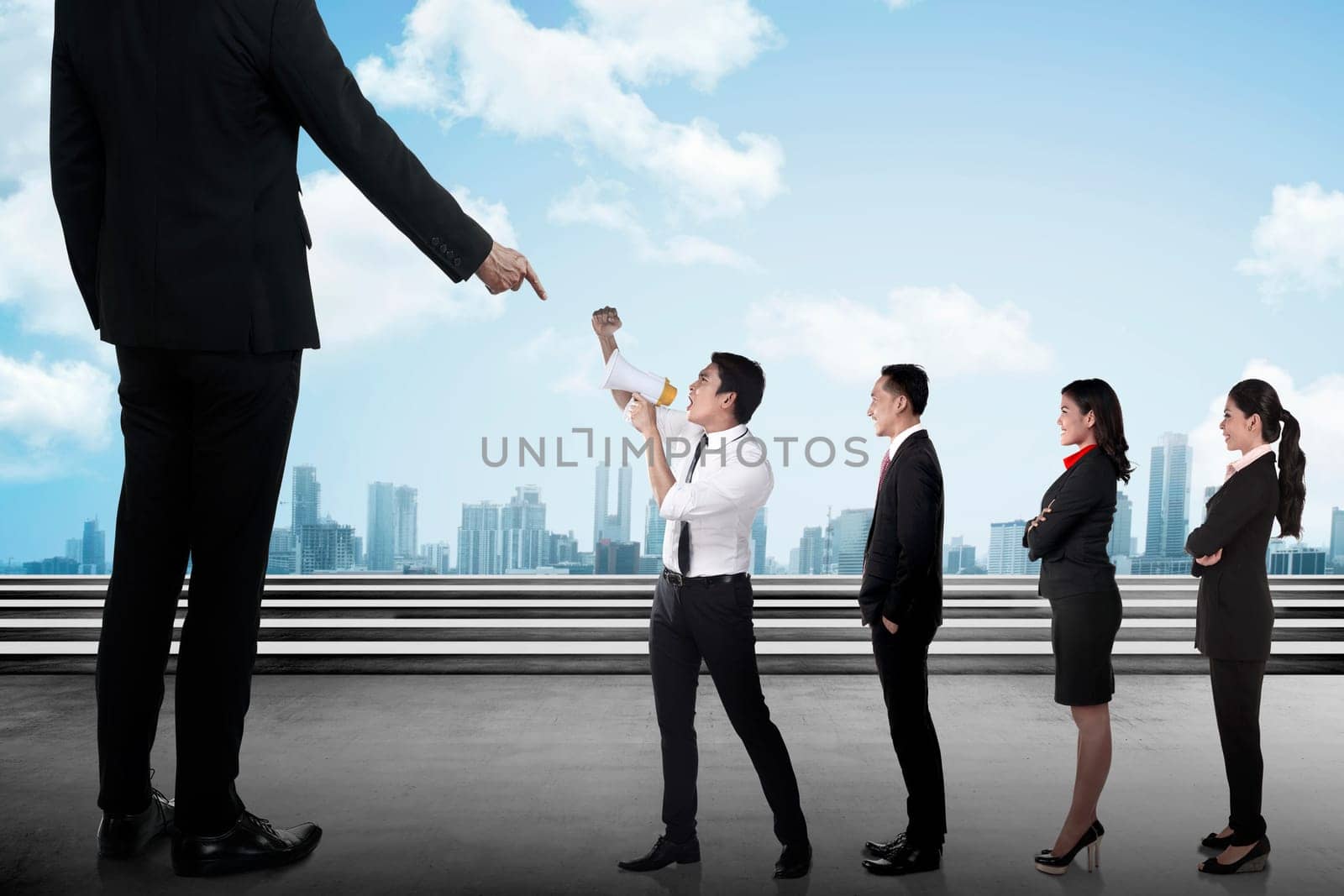Business team protest to the boss using megaphone. Business communication concept