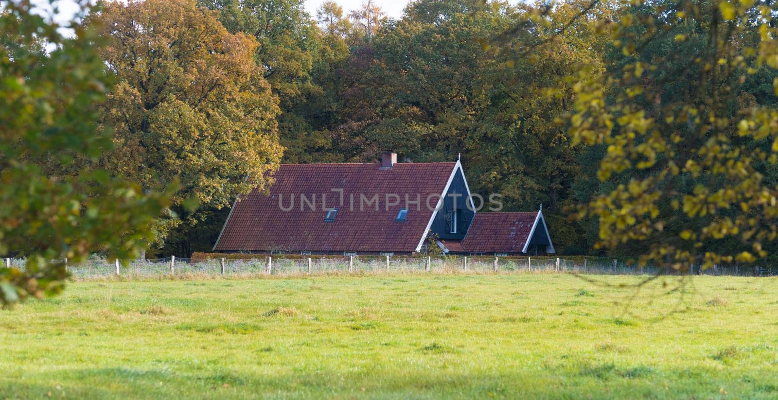 farmershouse in an autumn surrounding