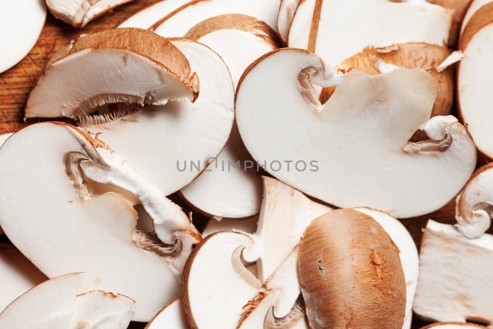 Format-filling view of sliced mushrooms.