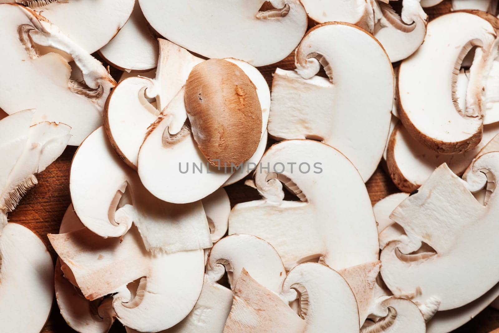 Format-filling view of sliced mushrooms.