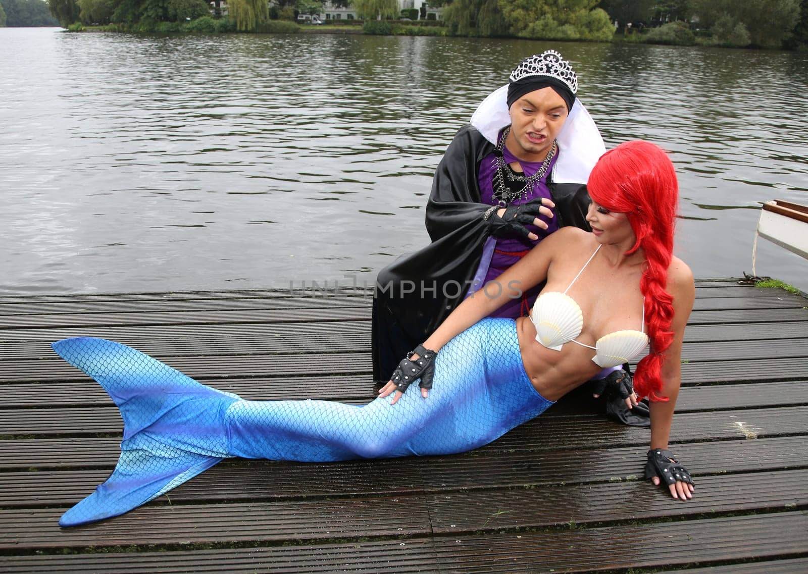 Julian F.M. Stoeckel ( evil stepmother of Snow White ) and Micaela Schaefer ( mermaid Arielle ) ,. Dragon boat race in favor of Hamburg children's aid projects at the Hansa Rowing Club on the Alster Hamburg ,09.09.2017.