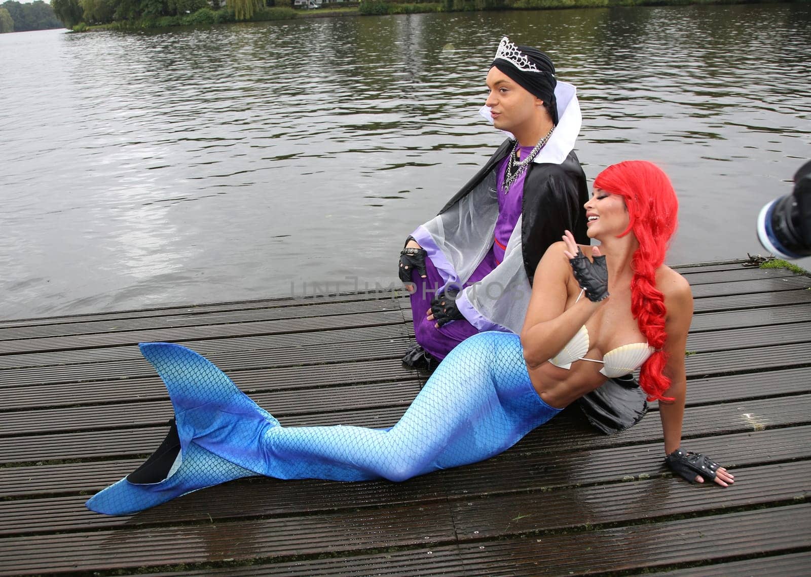 Julian F.M. Stoeckel ( evil stepmother of Snow White ) and Micaela Schaefer ( mermaid Arielle ) ,. Dragon boat race in favor of Hamburg children's aid projects at the Hansa Rowing Club on the Alster Hamburg ,09.09.2017.