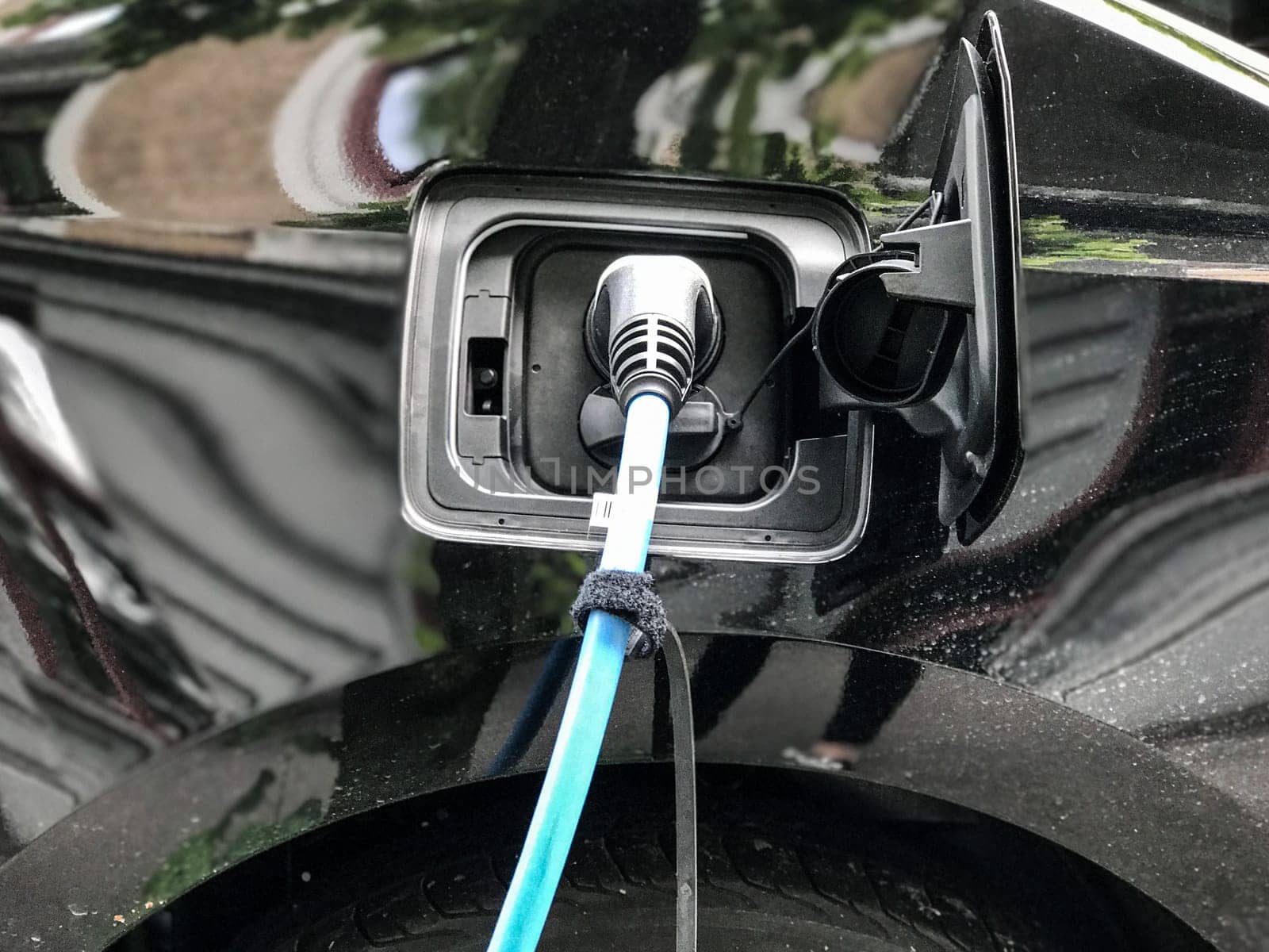Electric car charging station in Oslo. Eco automobile that sparked a revolution